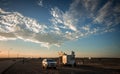 Muscat, Oman, December 29, 2019: 4x4 stopped in a typical roadside tent at orange sunset