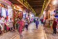 MUSCAT, OMAN - FEBRUARY 22, 2017: People shopping in Muttrah souq in Muscat, Om