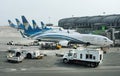 Muscat, Oman, picture dated August 28, 2019: Muscat new airport with Oman air planes. Oman air. BOEING 737-900ER.