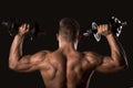 Muscle bodybuilder man lifting weights Royalty Free Stock Photo