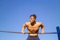 Muscle and strong guy workout russian pull ups Royalty Free Stock Photo
