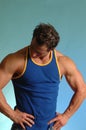 Muscle man in blue tanktop Royalty Free Stock Photo