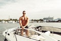 Muscle man on a boat Royalty Free Stock Photo