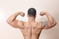 Muscle man, both arms flexed Royalty Free Stock Photo