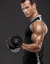 Muscle man lifting weights Royalty Free Stock Photo