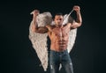 Muscle strong beautiful stripped male model valentin. Handsome sexy man with angel wings. Valentines Day, 14 February.