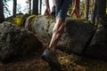 Muscled legs of the trail running athlete