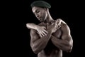 Muscled man on a black background Royalty Free Stock Photo