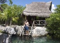 Muscular Amerasian young man ready to snorkel at Val Ku Lagoon Royalty Free Stock Photo