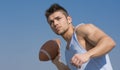 Muscular american football player ready to throw ball Royalty Free Stock Photo