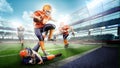 Muscular american football players in the action on stadium Royalty Free Stock Photo