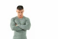 Muscular angry and dangerous man in tight shirt with scary look in his eyes. Royalty Free Stock Photo