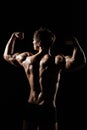 Muscular BACK of male model bodybuilder preparing for fitness tr Royalty Free Stock Photo