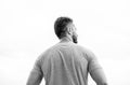 Muscular back man isolated on white. searching for inspiration. planning future goals. rich imagination. standing