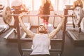 Muscular Bearded man during workout in the gym. Royalty Free Stock Photo