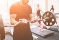 Muscular Bearded man during workout in the gym. Royalty Free Stock Photo