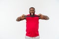 Muscular black young man exercising with elastic bands in studio, isolated on white. Royalty Free Stock Photo