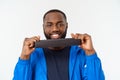 Muscular black young man exercising with elastic bands in studio, isolated on white. Royalty Free Stock Photo