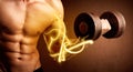 Muscular body builder lifting weight with energy lights on bicep Royalty Free Stock Photo