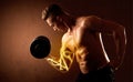 Muscular body builder lifting weight with energy lights on bicep