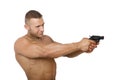 Muscular caucasian man with gun.