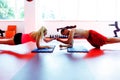 Muscular couple doing planking exercises Royalty Free Stock Photo