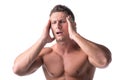 Muscular handsome man holding his head with for Royalty Free Stock Photo