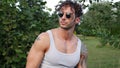 Muscular Hunk Man Outdoor in Countryside