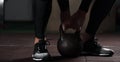 Muscular male adult exercising with kettle bell Royalty Free Stock Photo