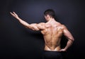 Muscular male back on black background Royalty Free Stock Photo