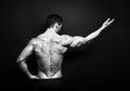 Muscular male back in black in white Royalty Free Stock Photo