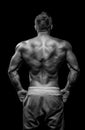 Muscular male model bodybuilder preparing for fitness training Royalty Free Stock Photo