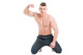 Muscular male model on his knees Royalty Free Stock Photo