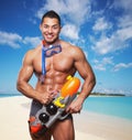 Muscular male with water gun.