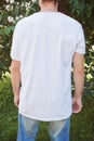 Muscular man back wearing white blank t-shirt