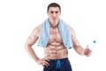 Muscular man with blue towel over neck, drinking water, isolated on white background