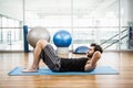 Muscular man doing abdominal on mat Royalty Free Stock Photo