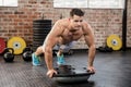 Muscular man doing bosu push ups Royalty Free Stock Photo