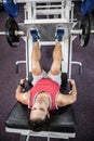 Muscular man doing exercise for legs Royalty Free Stock Photo