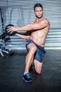 Muscular man doing exercise with medicine ball Royalty Free Stock Photo