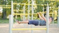 Muscular Man Doing Exercises on Horizontal Bar Royalty Free Stock Photo