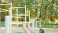 Muscular Man Doing Exercises on Horizontal Bar Royalty Free Stock Photo