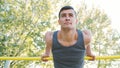 Muscular Man Doing Exercises on Horizontal Bar Royalty Free Stock Photo