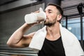 Muscular man drinking protein shake Royalty Free Stock Photo