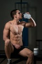 Muscular Man Drinking Water From Shaker Royalty Free Stock Photo