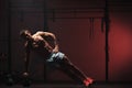 Muscular man exercising with kettle bell in gym Royalty Free Stock Photo