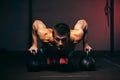 Muscular man exercising with kettle bell in gym Royalty Free Stock Photo