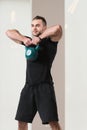Muscular Man Exercising With Kettle-bell Royalty Free Stock Photo