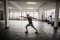 Muscular man flexing muscles in gym Royalty Free Stock Photo