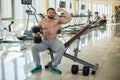 Muscular man in gym. Royalty Free Stock Photo